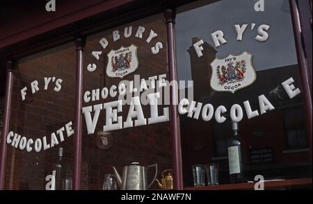 Confectioners and chocolate shop, Frys, Cadburys, Chocolate Veal, painted on store windows - 1930s, West Midlands, UK Stock Photo