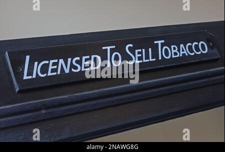 sign above the door, Licensed To Sell Tobacco - cigarettes, cigars,, shag, pipes etc - "CONTOB" ("confectionery and tobacco") Stock Photo