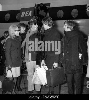John Lennon with wife Cynthia and George Harrison and his wife Patti ...