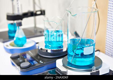 Flasks and magnetic stirrer with heating Stock Photo