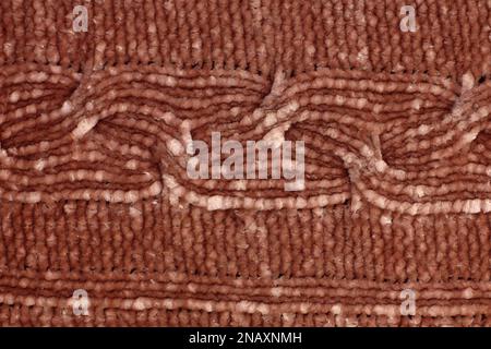 Soft light natural texture of knitted wool textile material background. Brown crochet cotton fabric woven canvas texture close up Stock Photo