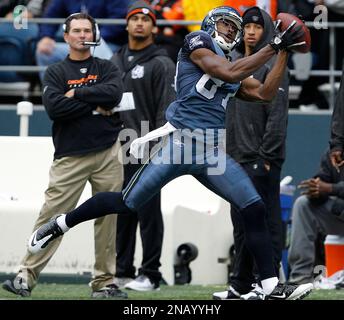 Seattle Seahawks' Ben Obomanu returns a kick against the Arizona Cardinals  during an NFL football game, Sunday, Oct. 18, 2009, in Seattle. (AP  Photo/Ted S. Warren Stock Photo - Alamy