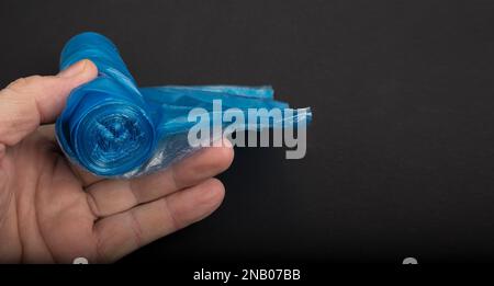 Dustbin Polythene colored Bags on a black Stock Photo