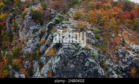 An aerial view of rocky cliffs with autumn trees near Harpers Ferry, Virginia Stock Photo