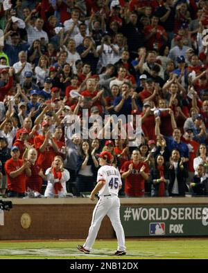 Rangers fans cheer during game 4 of the World Series between the Texas  Rangers and the St. Louis Cardinals at Rangers Ballpark in Arlington, Texas  on October 23, 2011. The Rangers defeated