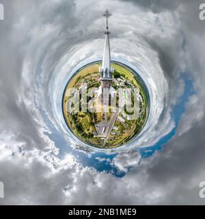 little planet transformation of spherical panorama 360 degrees with church. Spherical abstract aerial on church. Curvature of space. Stock Photo
