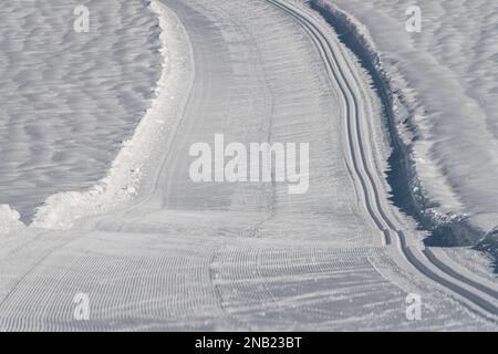 Ski snowy tracks with white frosty snow near Hall willage in winter Austria Stock Photo