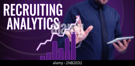 Sign displaying Recruiting Analytics. Business approach used to track the identification of the candidates Stock Photo