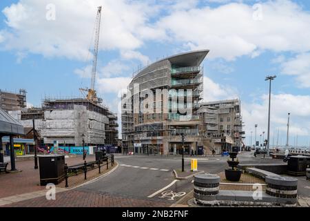 Apartment blocks in Poole harbour having their cladding replaced following Grenfell Tower disaster in Poole, Dorset, UK on 13 February 2023 Stock Photo