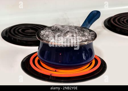 Boiling Pot Of Water On Hot Electric Burner Stock Photo, Picture and  Royalty Free Image. Image 34317573.