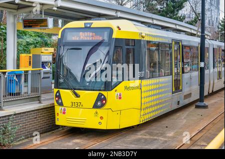 MANCHESTER, UK, 11TH FEBRUARY 2023: Manchester Metrolink tram at Media City Station Stock Photo