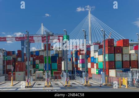 LBCT, Long Beach Container Terminal, with the Gerald Desmond Bridge shown in the background. Shown in the Port of long Beach, California. Stock Photo