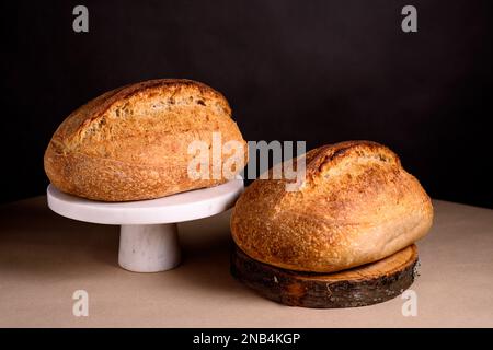 Home baked sourdough breads. Fresh, homemade sourdough breads. Stock Photo