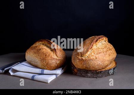 Home baked sourdough breads. Fresh, homemade sourdough breads. Stock Photo