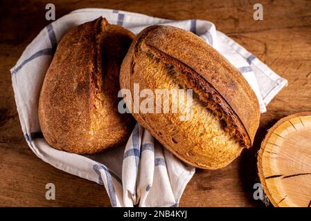 Home baked sourdough breads. Fresh, homemade sourdough breads. Stock Photo