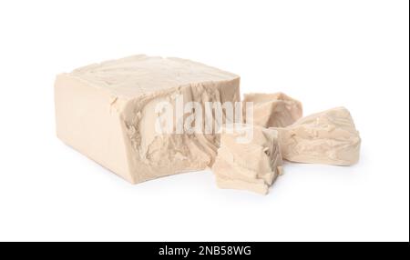 Pieces of compressed yeast on white background Stock Photo