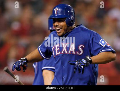 Texas Rangers Nelson Cruz celebrates after hitting a solo homerun during  the seventh inning of game 6 of the World Series against the St. Louis  Cardinals in St. Louis on October 27