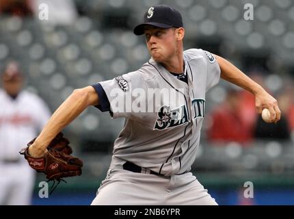 Seattle Mariners starting pitcher Charlie Furbush (41) talks with catcher  Chris Gimenez, right, after giving up a single to Texas Rangers' Josh  Hamilton in the third inning of a baseball game Sunday