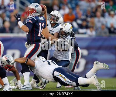 Patriots quarterback Tom Brady is surrounded by the Colts defense during  the fourth quarter of the AFC Division Playoffs at Gillette Stadium on  January 16, 2005 in Foxboro, Massachusetts. The Patriots defeated