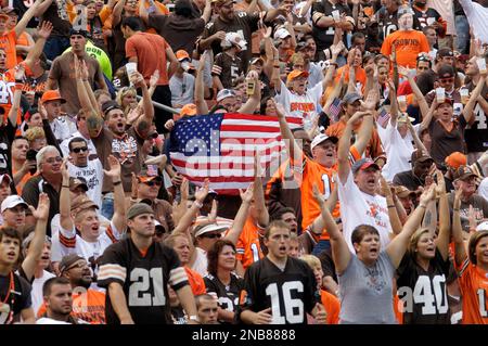 Fans in the Dawg Pound at Cleveland Browns Stadium whoop it up during the  Browns' 51-45 win over the Cincinnati Bengals in an NFL football game  Sunday, Sept. 16, 2007, in Cleveland. (