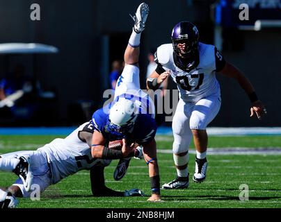 https://l450v.alamy.com/450v/2nb8hjm/tcu-safety-johnny-fobbs-21-upends-air-force-quarterback-connor-dietz-11-in-the-fourth-quarter-of-an-ncaa-college-football-game-saturday-sept-10-2011-in-falcon-stadium-at-air-force-academy-colo-the-horned-frogs-won-35-19-ap-photo-kevin-kreck-2nb8hjm.jpg