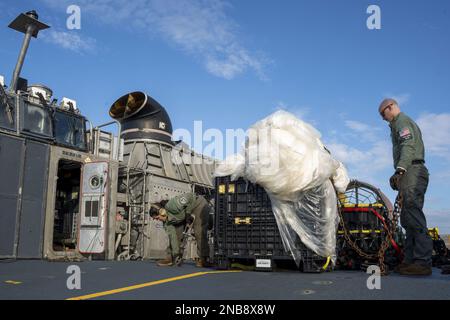 Sailors assigned to Assault Craft Unit 4 prepare material recovered in the Atlantic Ocean from a Chinese high-altitude balloon for transport to federal agents at Joint Expeditionary Base Little Creek, Virginia Beach, Virginia, on February 10, 2023. At the direction of the President of the United States and with the full support of the Government of Canada, a U.S. Air Force F-22 Raptor, on the authority of Northern Command, engaged and brought down the Chinese spy balloon within sovereign U.S. airspace and over U.S. territorial waters on February 4, 2023. Photo by MC1 Ryan Seelbach/U.S. Navy/UP Stock Photo