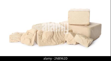 Pieces of compressed yeast on white background Stock Photo