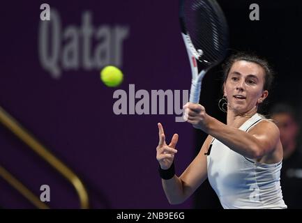 Doha, Qatar. 13th Feb, 2023. Ipek Oz of Turkey hits a return during the singles round of 32 match against Victoria Azarenka of Belarus at WTA500 Qatar Open 2023 in Doha, Qatar, Feb. 13, 2023. Credit: Nikku/Xinhua/Alamy Live News Stock Photo