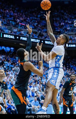 February 13, 2023: Miami (Fl) Hurricanes forward A.J. Casey (0) guards the jump shot from North Carolina Tar Heels forward Armando Bacot (5) during the first half of the ACC basketball matchup at Dean Smith Center in Chapel Hill, NC. (Scott Kinser/CSM) Stock Photo