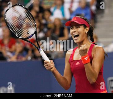 Ana Ivanovic of Serbia reacts after she scores against Elena Dementieva of  Russia during the quarter final of the Dubai Duty Free Women's Tennis Open  2008 in Dubai, United Arab Emirates,Thursday Feb.