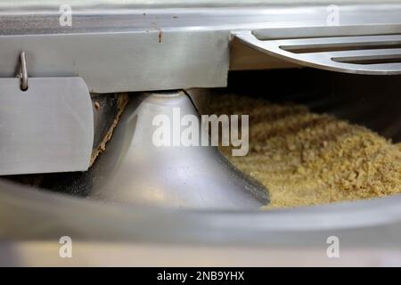 Bowl of vacuum cutter machine close up. Selective focus. Stock Photo