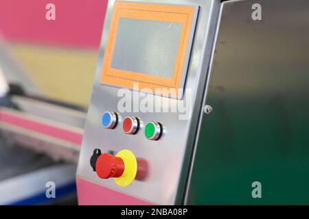 Control panel of modern food production equipment. Selective focus. Stock Photo