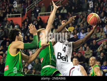 Canada's Jermaine Anderson, right, drives with the ball guarded by Brazil's  Leandro Barbosa during their basketball game of the Marchand Continental  Cup in San Juan, Thursday, Aug. 20, 2009. Brazil won 87-69. (AP  Photo/Ricardo Arduengo Stock Photo