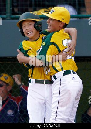 Huntington Beach, Calif.'s Eric Anderson (12) celebrates with