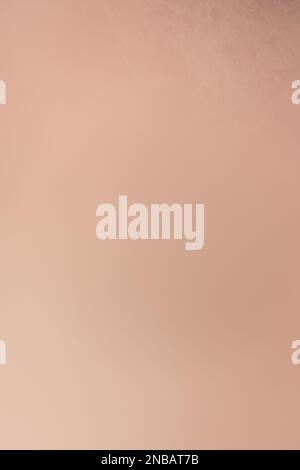 A dull beige background with minimal texture and a soft color gradient. Stock Photo