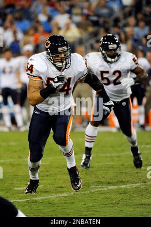 KRT SPORTS STORY SLUGGED: FBN-BEARS-BROWNS KRT PHOTOGRAPH BY EMILY  RASINSKI/AKRON BEACON JOURNAL (October 9) CLEVELAND, OH -- Chicago Bears  linebackers Hunter Hillenmeyer (92) and Brian Urlacher (54) bring down Cleveland  Browns ball