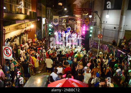 Sao Paulo, Brazil. 13th Feb, 2023. People celebrate in the street at a party a few days before the start of the parades of the best samba schools at the Sambadrom. Dancers, musicians and onlookers are warming up for the mega party. Credit: Rafael Magalhaes/dpa/Alamy Live News Stock Photo