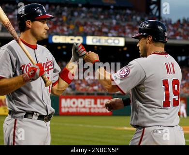 Left to right, Mark Lerner, Washington Nationals owner, Ryan Zimmerman,  third baseman for the Washington Nationals, Dan Snyder, owner of the  Washington Redskins, and Chris Cooley, tight end Washington Redskins attend  an