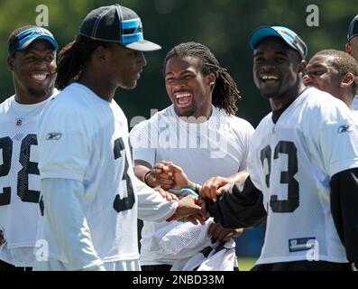 Carolina Panthers running back Jonathan Stewart, left, breaks free