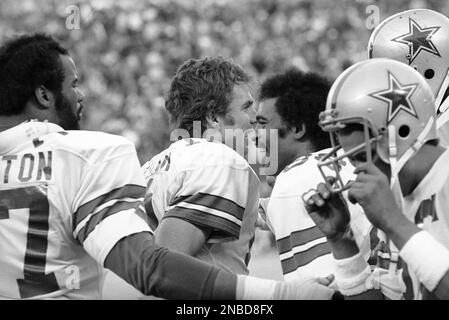 Roger Staubach and Drew Pearson, right, exchange smiles after their fourth  quarter pass play set up for the winning field goal by the Dallas Cowboys  in the last three seconds of their