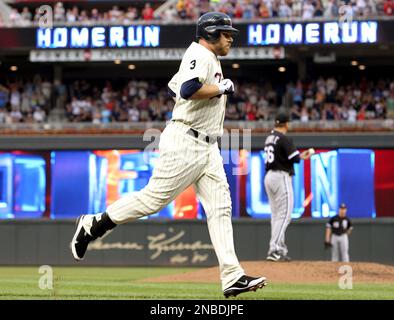 Minnesota Twins' Jason Kubel (16) celebrates his grand slam off