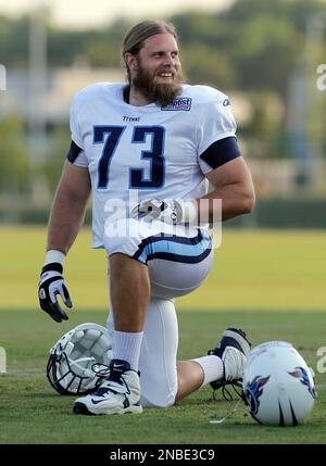 Tennessee Titans guard Jake Scott (73) talks with young fans before an NFL  football preseason game between the Chicago Bears and the Titans on  Saturday, Aug. 27, 2011, in Nashville, Tenn. (AP