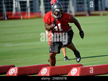 Tampa Bay Buccaneers defensive end Da'Quan Bowers (91) returns a fumble  against the Washington Redskins during the first quarter of their preseason  game at FedEx Field in Landover, MD, Thursday, September 1