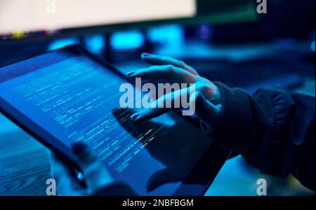 Tablet, programmer hands and html screen for coding software system. cyber security ro database hacking. Information technology, programming or coding Stock Photo