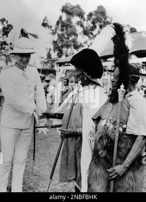 Governor of Kenya Evelyn Baring with senior Chief Njiri at ceremony ...