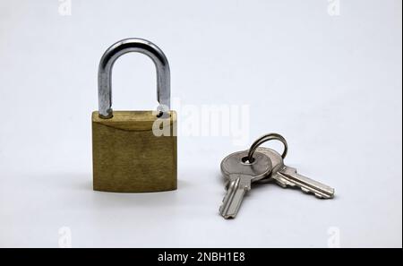 Padlock with keys isolated on white background Stock Photo