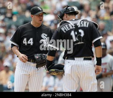 Minnesota Twins' A.J. Pierzynski, left, and Matthew LeCroy celebrate their  9-3 win over the Toronto Blue Jays in Toronto Sunday April 13, 2003. LeCroy  hit a three-run home run in the eighth