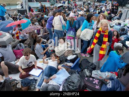 The founders of the oldest German Harry Potter fan club, Sarah Preissner  (L) and Saskia Preissner (R), wait for the admission to the CinemaxX Cinema  in Berlin, Germany, 12 July 2011. Hundreds
