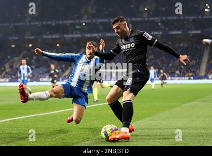 Sabadell, Barcelona, Spain. 13th Feb, 2023. Barcelona Spain 13.02.2023 Oscar Gil (Espanyol) and Diego Rico (Real Sociedad) battle for the ball during the La Liga Santander between Espanyol and Real Sociedad at RCDE Stadium on 13 February 2023 in Barcelona. (Credit Image: © Xavi Urgeles/ZUMA Press Wire) EDITORIAL USAGE ONLY! Not for Commercial USAGE! Stock Photo