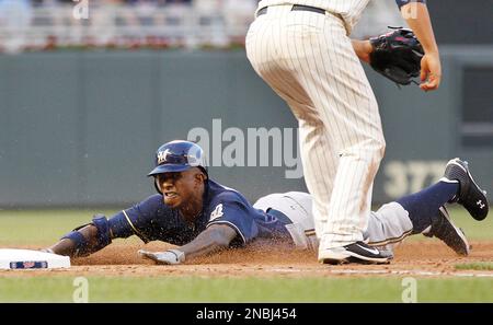 Milwaukee Brewers' Nyjer Morgan has some fun during a spring training  baseball workout, Saturday, March 3, 2012, in Phoenix. (AP Photo/Morry Gash  Stock Photo - Alamy